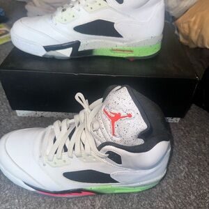 Jordan White and Black Sneakers with Green Accents